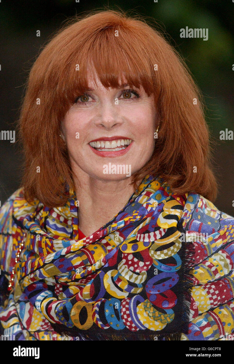 Stefanie Powers arrives at a reception and private view of HM Queen Elizabeth II's Hats and Handbags at the Kensington Palace in Central London. Stock Photo