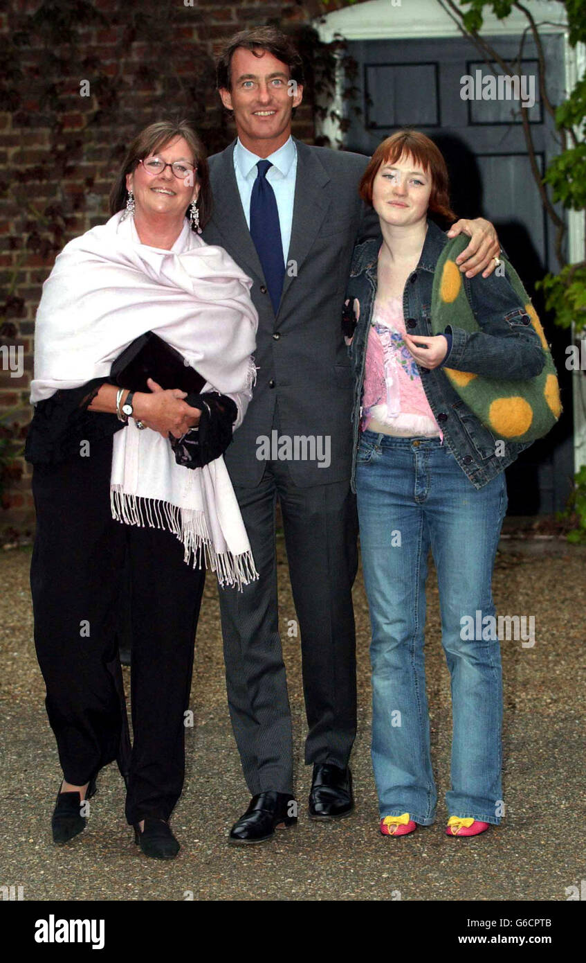 Tim Jeffries with his Mum Hilary jefferies and niece Amilia McIlvenny arrive at a reception and private view of HM Queen Elizabeth II's Hats and Handbags at the Kensington Palace in Central London. Stock Photo
