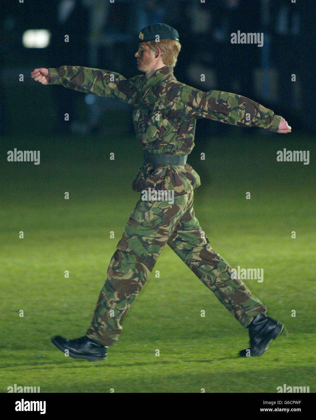 Prince Harry wears camoflage as he commands the cadets of Eton School's Combined Cadet Forces during their annual Tattoo at the school. Stock Photo