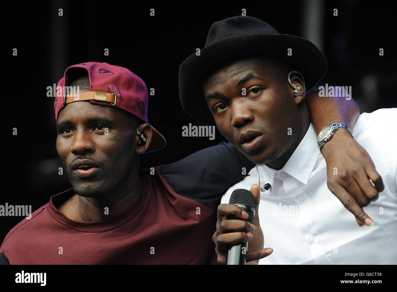 Wretch 32 (left) and Jacob Banks perform on stage during day two of the Fusion Festival at Cofton Park, Birmingham. Stock Photo
