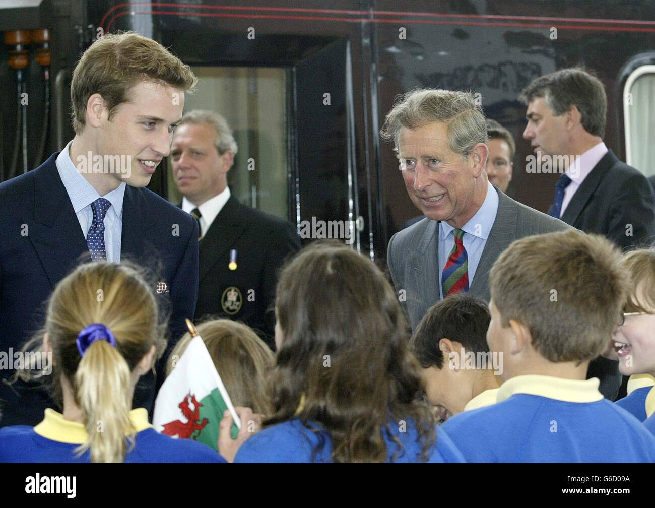 Prince William, and his father, Prince Charles, talk to wellwishers as they arrive at Bangor Station, for a visit to Wales in the run-up to his 21st birthday. * Two days before coming-of-age, William and his father were visiting the Anglesey Food Fair in north Wales and Newport Action for Single Homeless (NASH) in south Wales. Stock Photo