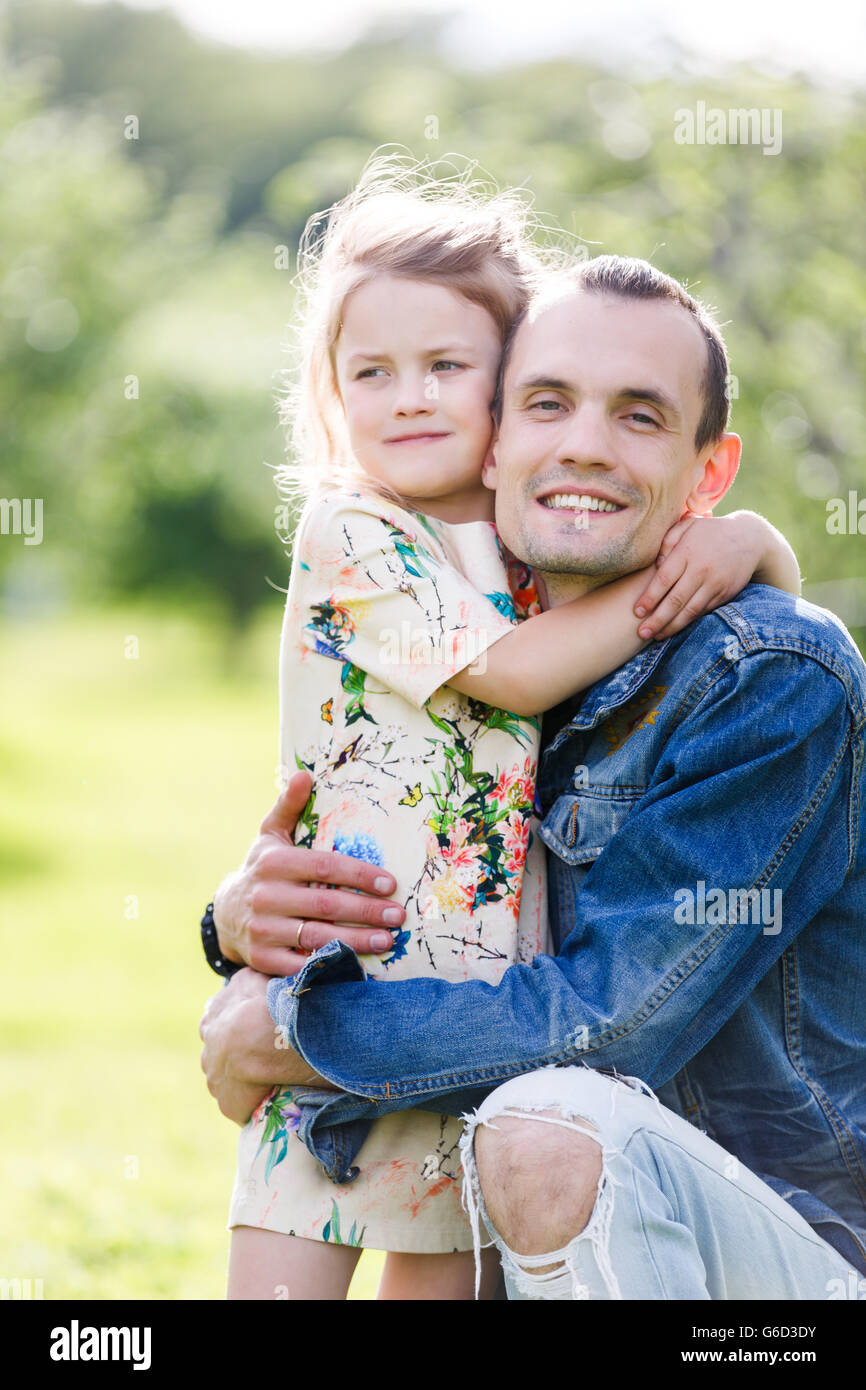 Father and daughter in green park Stock Photo - Alamy