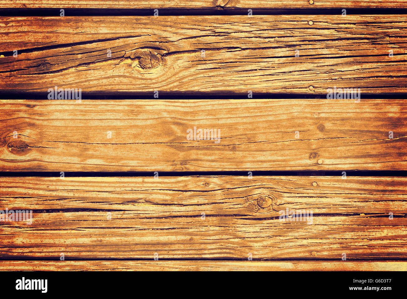 Top view of old weathered deck wooden board, wood background texture in vintage rustic style. Stock Photo