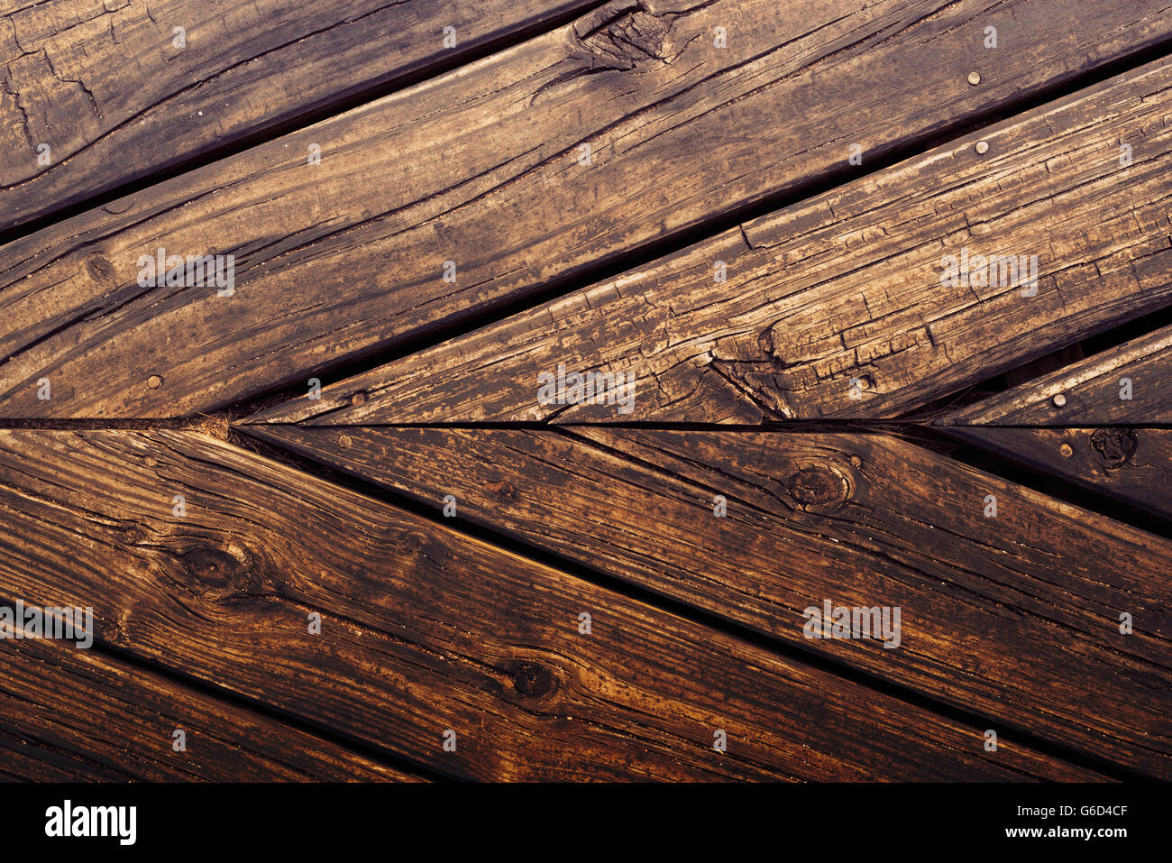 Close up top view of natural wood panel floor surface, hipster style rustic background texture. Stock Photo
