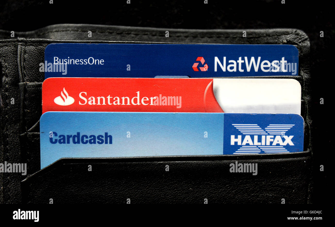 General view of a Halifax, Santander and NatWest bank card in a wallet Stock Photo