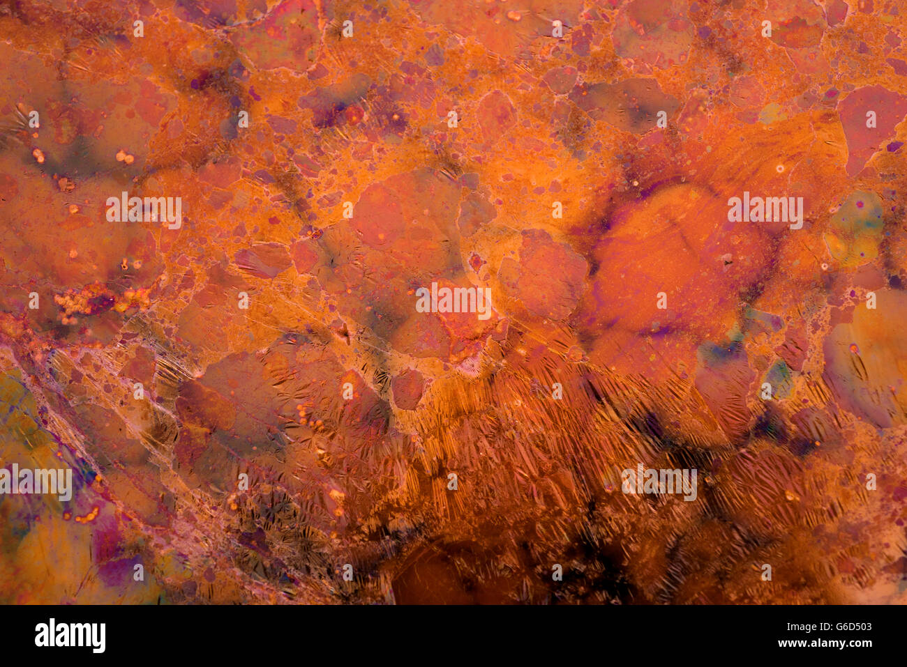 Grunge background in vibrant contrast color. Abstract art texture backdrop of red liquid. Stock Photo