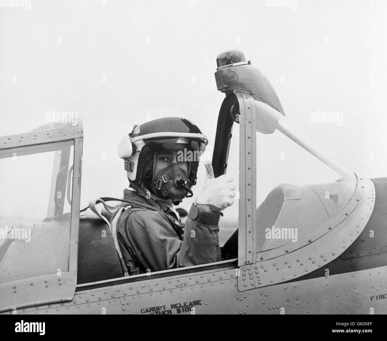 Prince Charles in the cockpit of a Chipmunk aircraft before flying from RAF Oakington in Cambridgeshire. He was accompanied by flying instructor Philip Pinney. Stock Photo