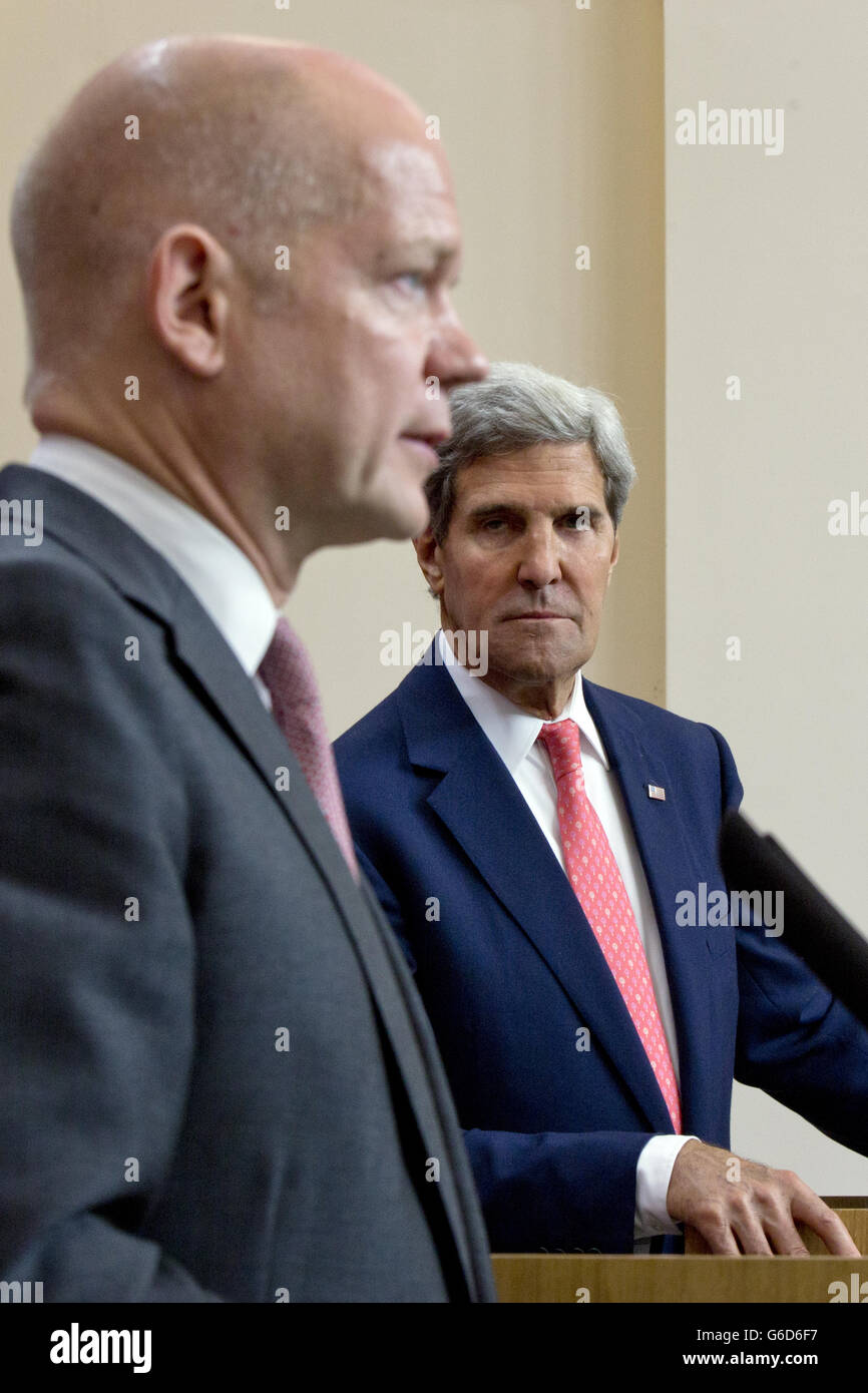Britain's Foreign Secretary William Hague and US secretary of State John Kerry arrive at a news conference held at the Foreign Office, London. Picture - David Bebber Stock Photo