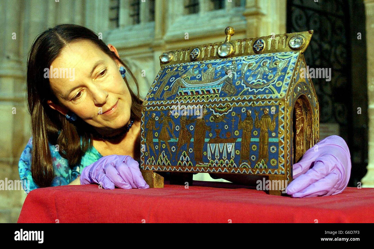 Marion Campbell, senior curator for metalwork at the Victoria and Albert museum in London, places the delicate 12th Century casket of Thomas Becket on display in Canterbury Cathedral, for two weeks. * The elaborate Limoges enamel casket c.1180-90 has been loaned to the cathedral from the Victoria and Albert museum as part of a thanksgiving service for art charity. Stock Photo