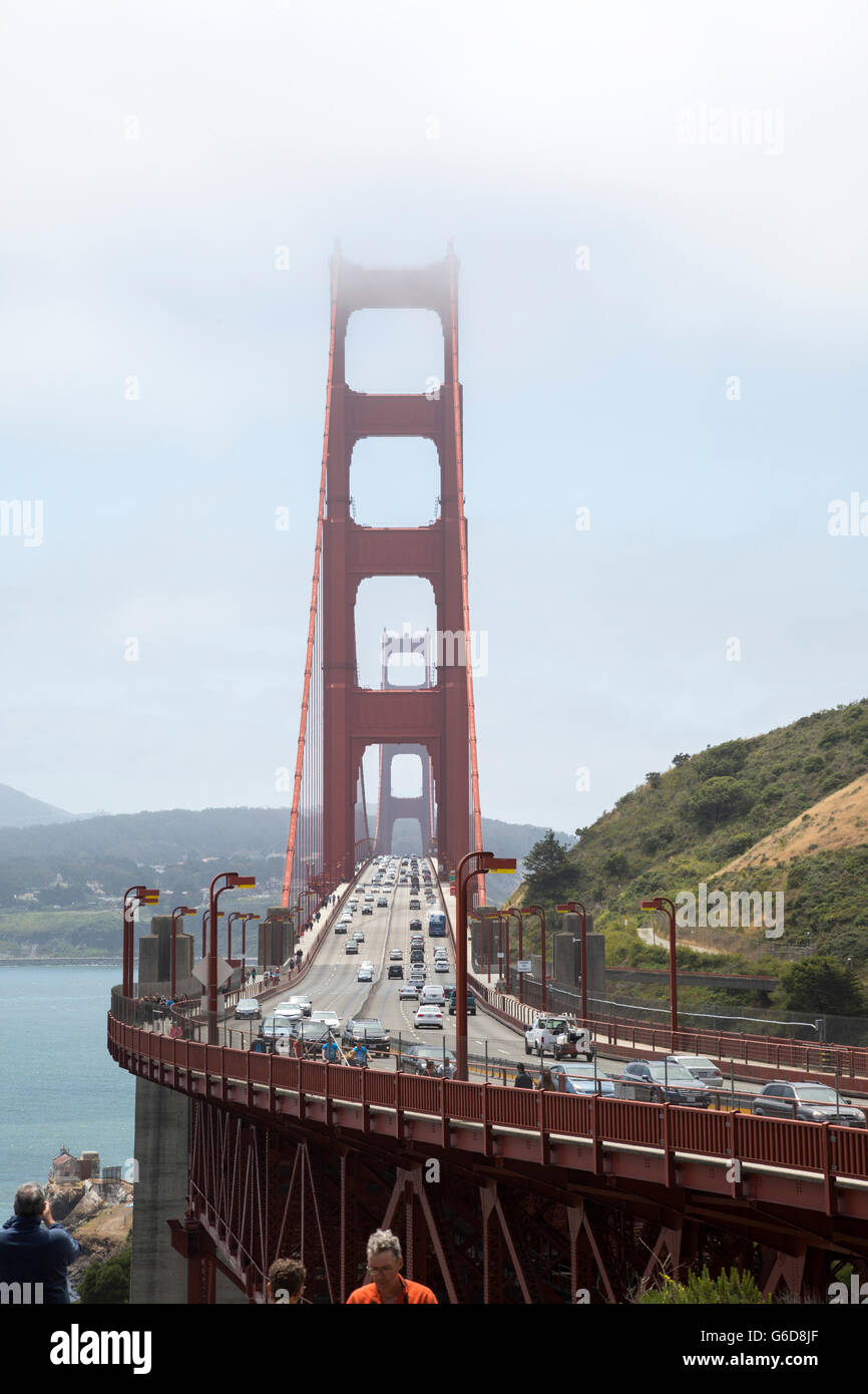 vertical view of Golden Gate Bridge with traffic and tourists Stock ...