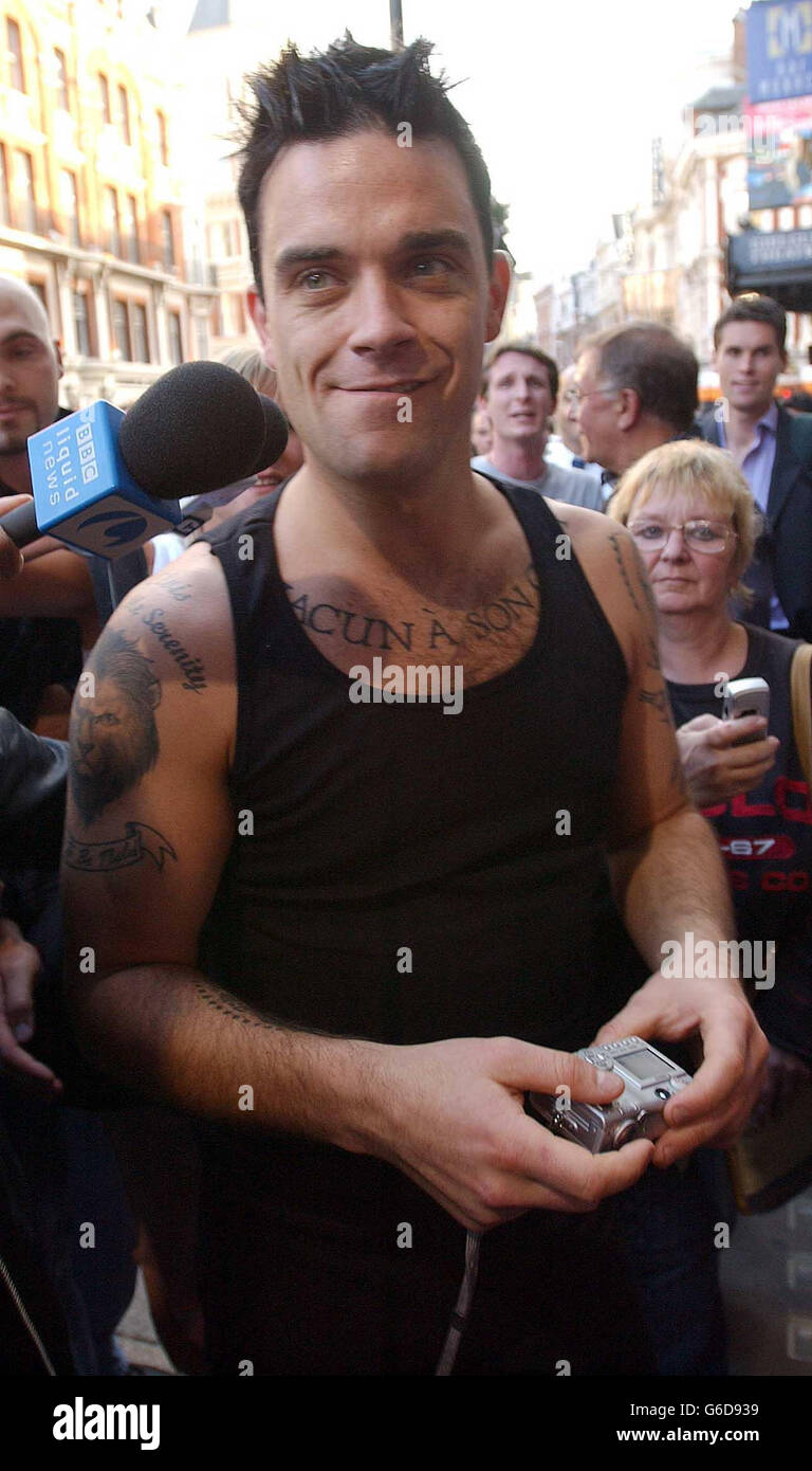 Robbie williams tattoo hires stock photography and images  Alamy
