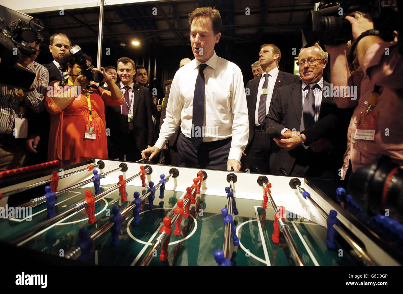 Liberal Democrats leader Nick Clegg plays table football during the Liberal Democrats' autumn conference at The Clyde Auditorium in Glasgow, Scotland. Stock Photo