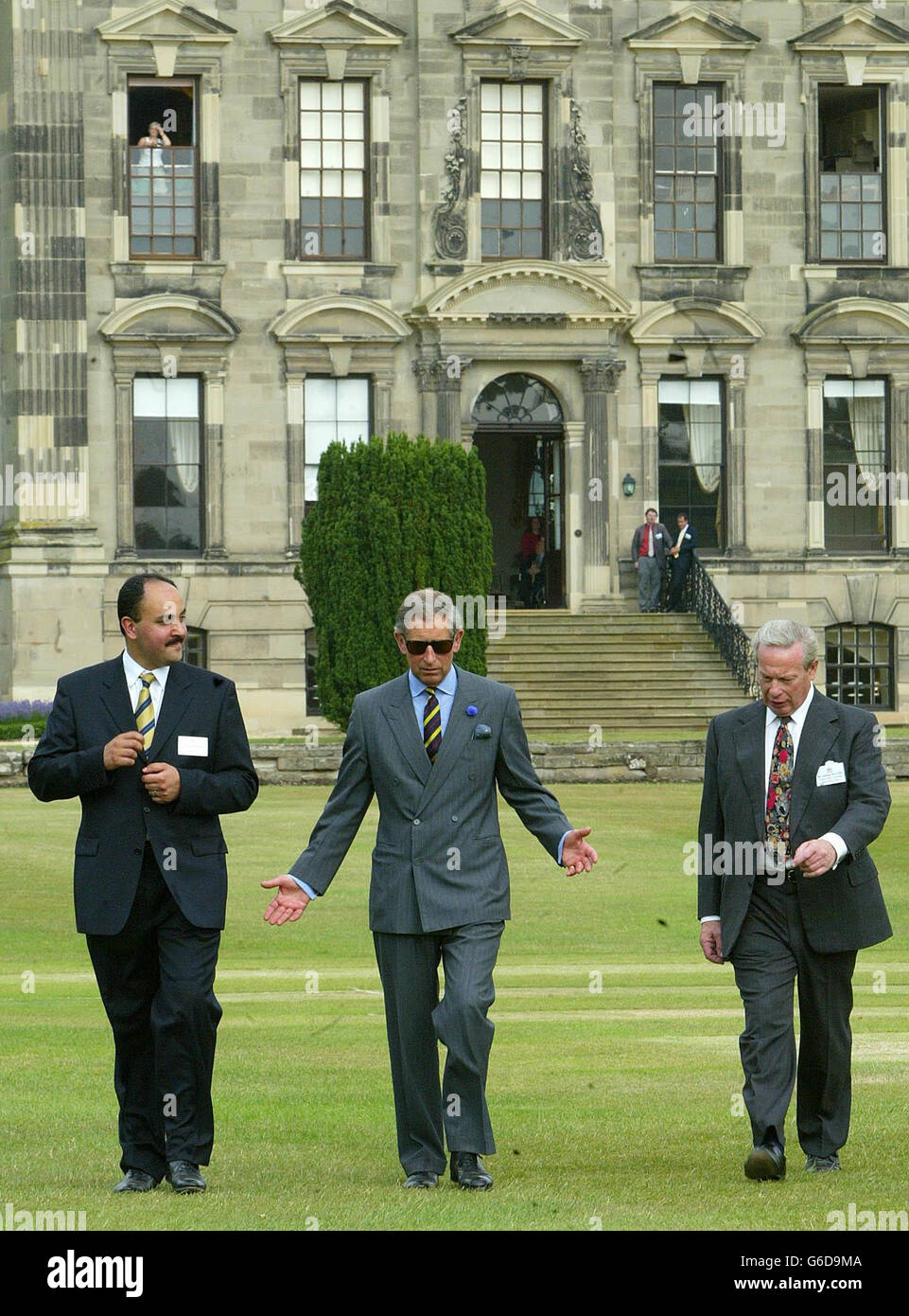 The Prince of Wales (centre) is shown around the house and grounds of Stoneleigh Abbey, Kenilworth, Warwickshire, by General manager, Shahab Seyfollahi (left) and Chairman of Stoneleigh Abbey, Tony Bird. Stock Photo
