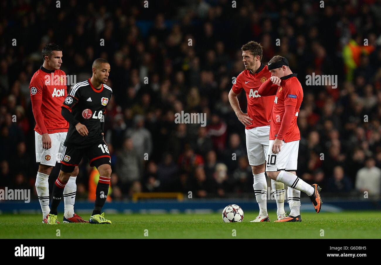(l-r) Manchester United's Robin van Persie, Michael Carrick and Wayne Rooney react after they concede an equalising goal to make it 1-1 Stock Photo