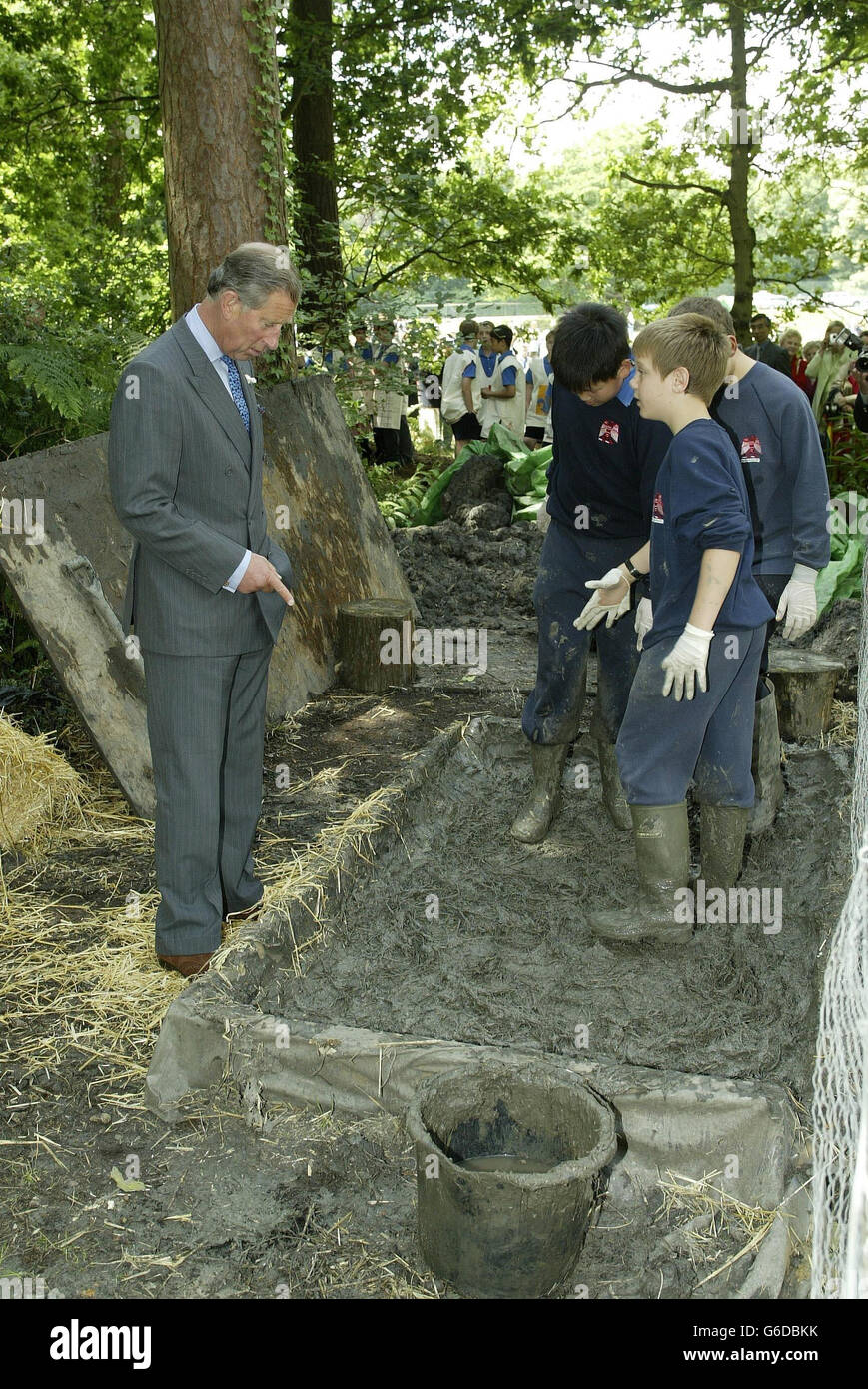 The Prince of Wales watches the preparation of wattle and daub, at the opening of the the Tudor House at Eagle House School in Sandhurst, Berkshire. * Charles was visiting the private school to attend a Tudor Fair to celebrate the opening of a replica 16th-Century house made with the help of the schoolchildren. Stock Photo