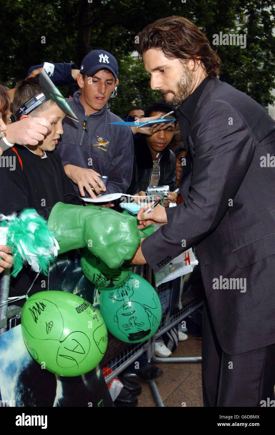 Eric Bana who plays the Hulk signs autographs as he arrives at the premiere of The Hulk at the Empire cinema in London's Leicester Square. Stock Photo