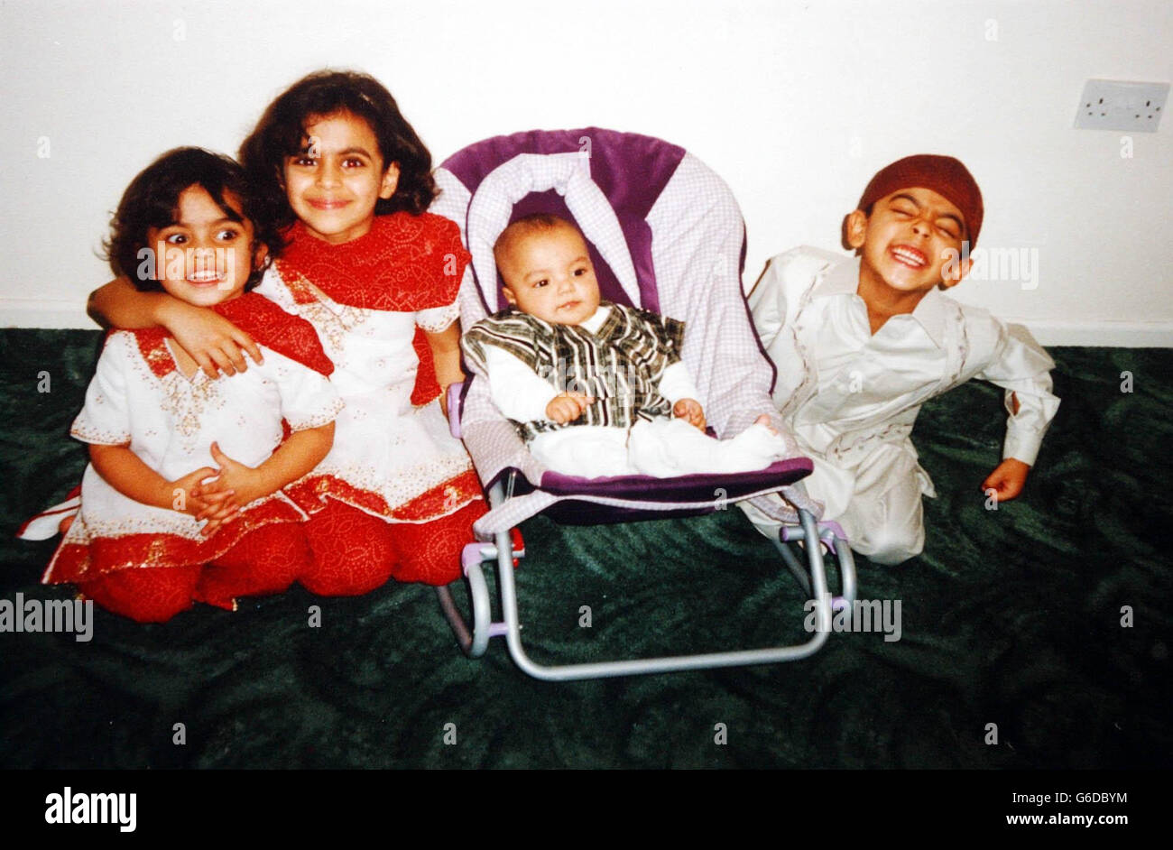 Undated collect photo of Moazzam Begg's children. British detainees at Guantanamo Bay will be among the first prisoners to face trial by secretive military tribunals, it emerged. * Moazzam, 35, and Feroz Abbasi, 23, are on US President George Bush's initial list of six who could face the death penalty, although neither charges nor exact details of the tribunals have been released by the US. Both men are accused of being al Qaida terrorists. Today Moazzam's father Azmat Begg said he was concerned his son, a father of four, would not receive a fair trial. Stock Photo
