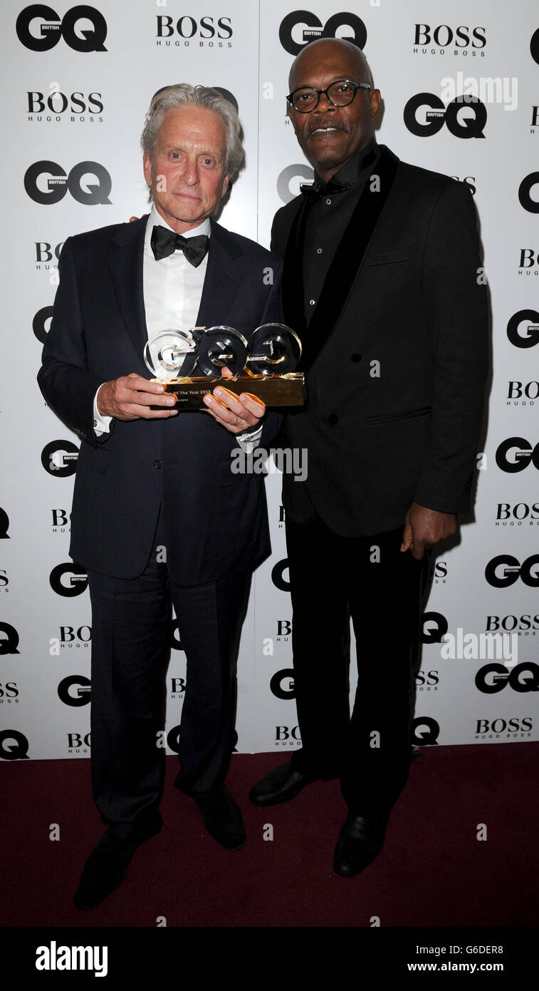 Michael Douglas, winner of the Legend award, poses with Samuel L Jackson  backstage at the GQ Men of the Year Awards in association with Hugo Boss at  the Royal Opera House, London