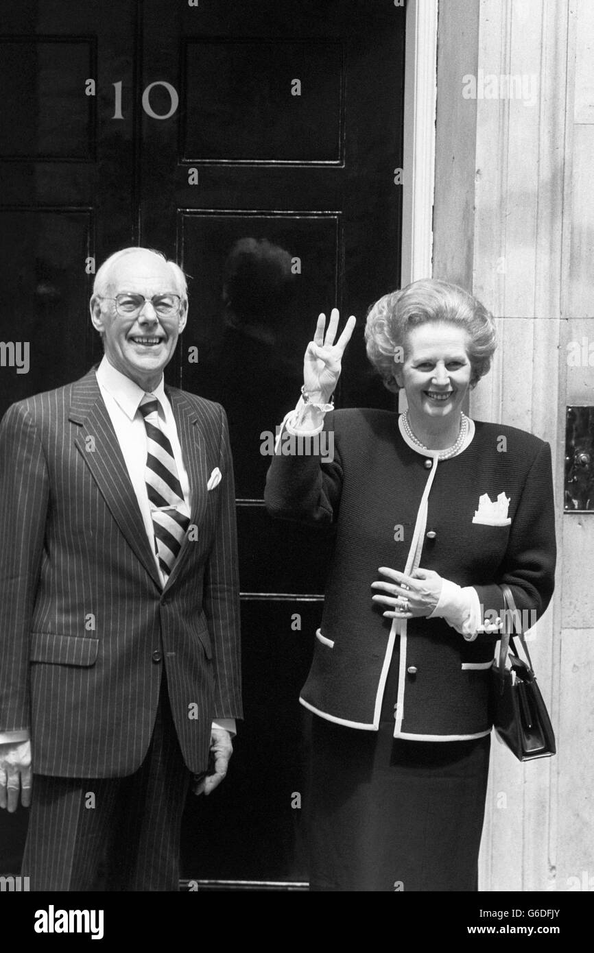 JUNE 11TH : On this day in 1987 Margaret Thatcher won a third term as Prime Minister after the Conservatives beat Labour by 376 seats to 229. Prime Minister Margaret Thatcher gives a three-fingered salute outside 10 Downing Street with her husband Denis as she begins her third successive term of office following the Conservative victory in the general election. Stock Photo