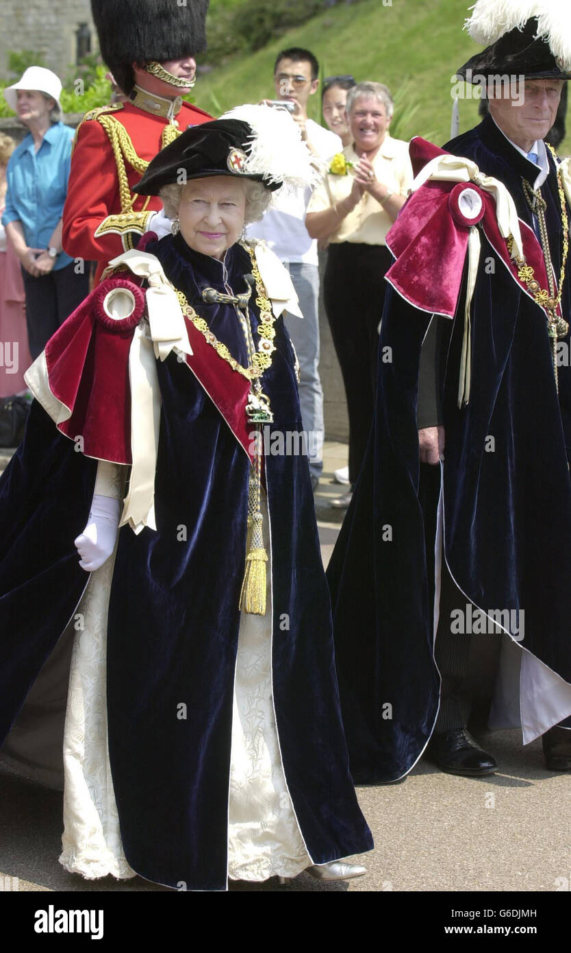 Britain s Queen Elizabeth II and the Duke of Edinburgh, walk down from Windsor Castle to St George's Chapel, for the annual Ceremony of the Garter procession. * The Garter is Britain s highest honour bestowed by the Queen on men and women for outstanding achievement and service to the nation. For fans of pomp and ceremony, the splendour of Garter Day at Windsor Castle is hard to beat. Stock Photo