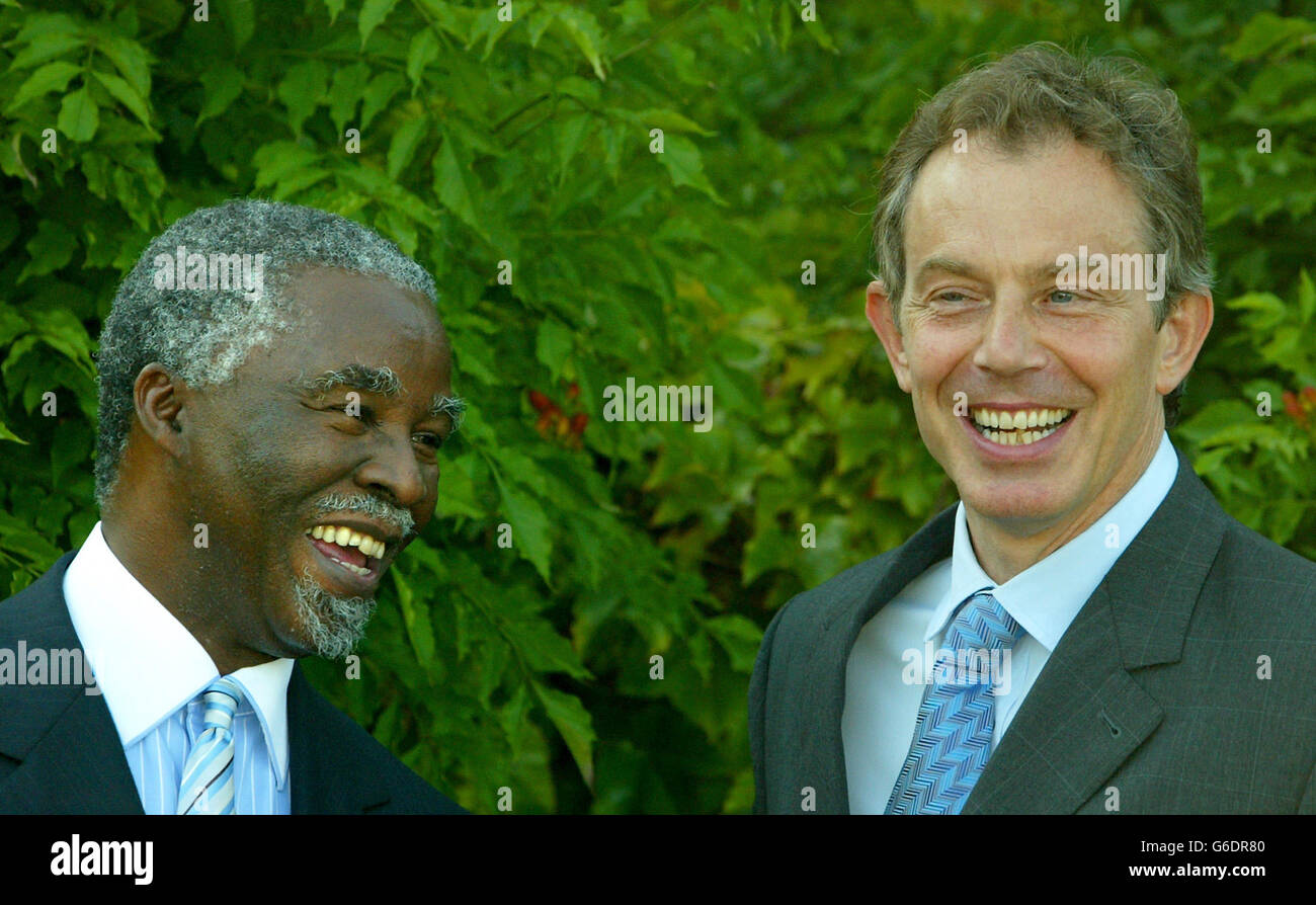 Prime Minister Tony Blair (right) jokes with South African President Thabo Mbeki whilst posing for photographers at the Progressive Governance Summit in Berkshire. Stock Photo