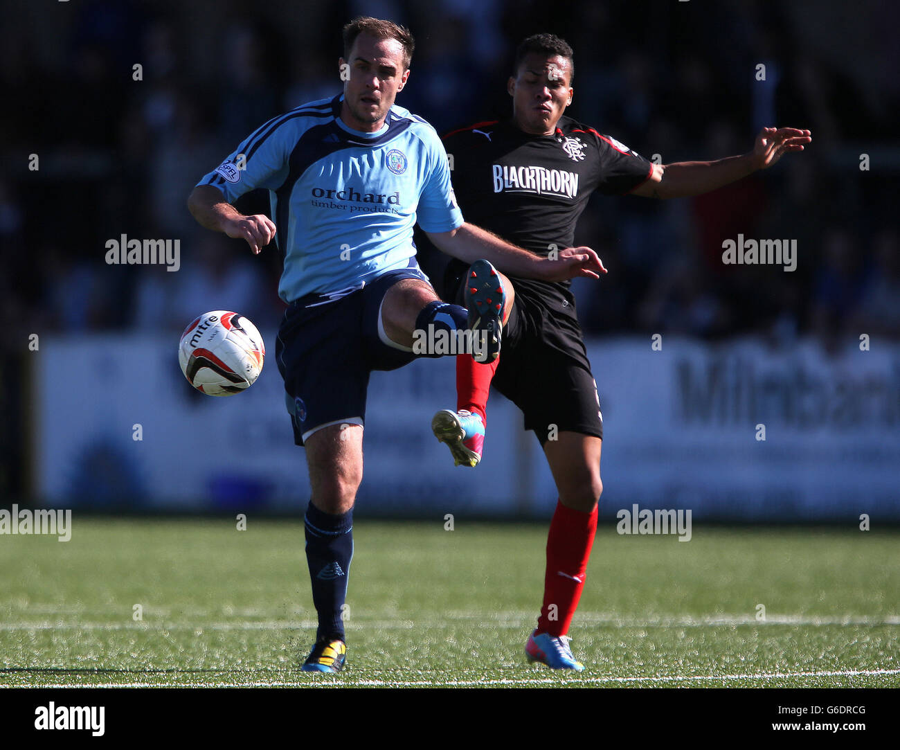 Soccer - Scottish League One - Forfar Athletic v Rangers - Station Park. Forfar's Iain Campbell (left) challenges Rangers Arnold Peralta during the Scottish League One match at Station Park, Forfar. Stock Photo