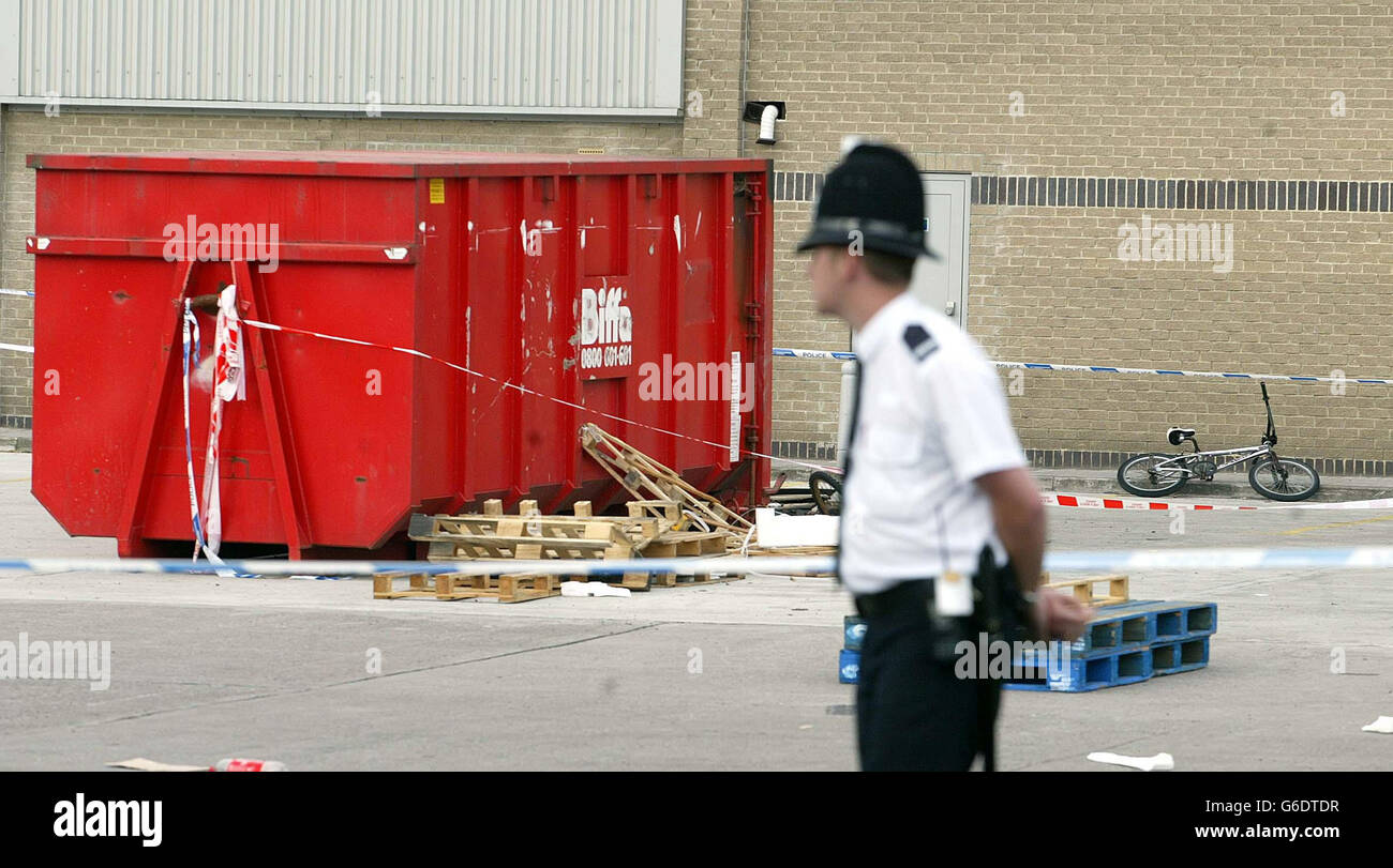 A skip in the Team Valley retail park, Tyneside, where a fire crew discovered a 15-year-old boy burning last night. The youth was being treated in the high dependency unit of the Queen Elizabeth Hospital in Gateshead. * Police said they arrested two youths following the discovery at the retail park in Gateshead just before 8pm yesterday. They were being questioned in connection with the cause of the incident, a Northumbria Police spokesman added. He said officers would release more details later. 01/04/2004 A 15-year-old boy was being sentenced Thursday 1 April 2004 for killing a teenager who Stock Photo