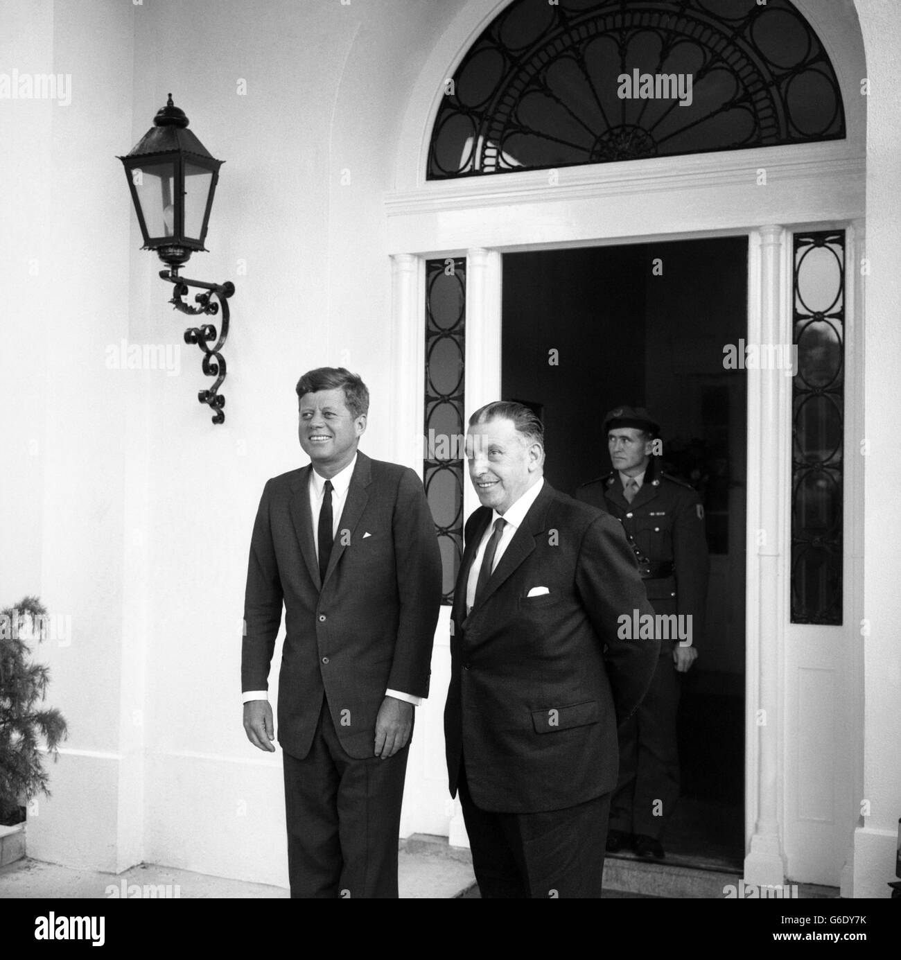 PRESIDENT JOHN F. KENNEDY of America with MR. SEAN LEMASS, Irish Prime Minister, at the American Embassy in Dublin during the President's three-day visit to Ireland. Earlier in the day, Mr. Kennedy had visited Dunganstown, Co. Wexford, where his great-grandfather lived before emigrating to America in 1850. June 28th 1963 PAR 103890-17 (PNR/P-G) Stock Photo