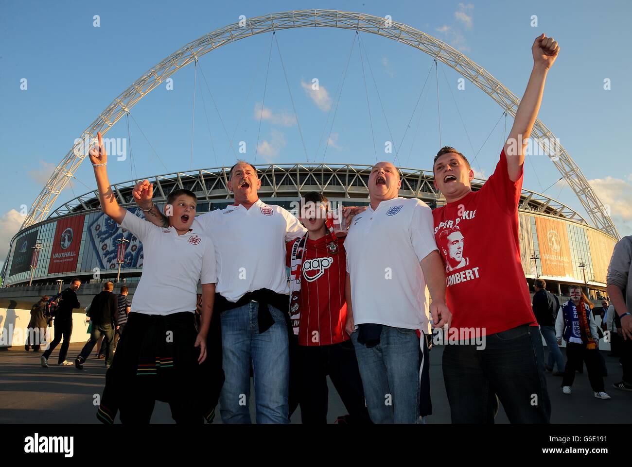 Soccer - 2014 FIFA World Cup - Qualifier - Group H - England v Moldova - Wembley Stadium. England fans Owen, Simon, Joe, Steven and Billy outside Wembley Stadium prior to kick-off Stock Photo