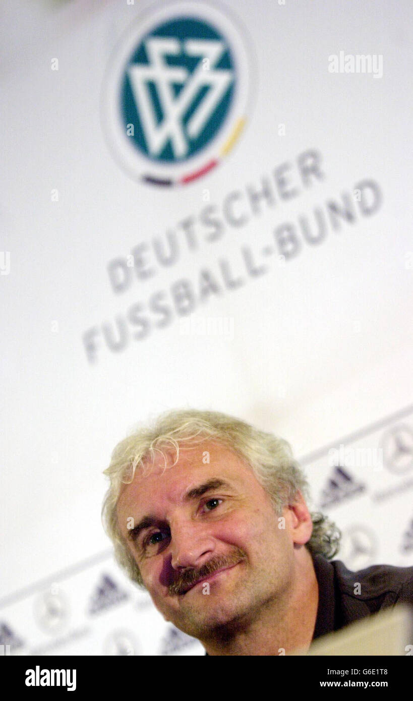 German coach Rudi Voller talks with the media at Crutherland House Hotel, East Kilbride, ahead of the Euro 2004 qualifier match against Scotland at Hampden Park. Stock Photo