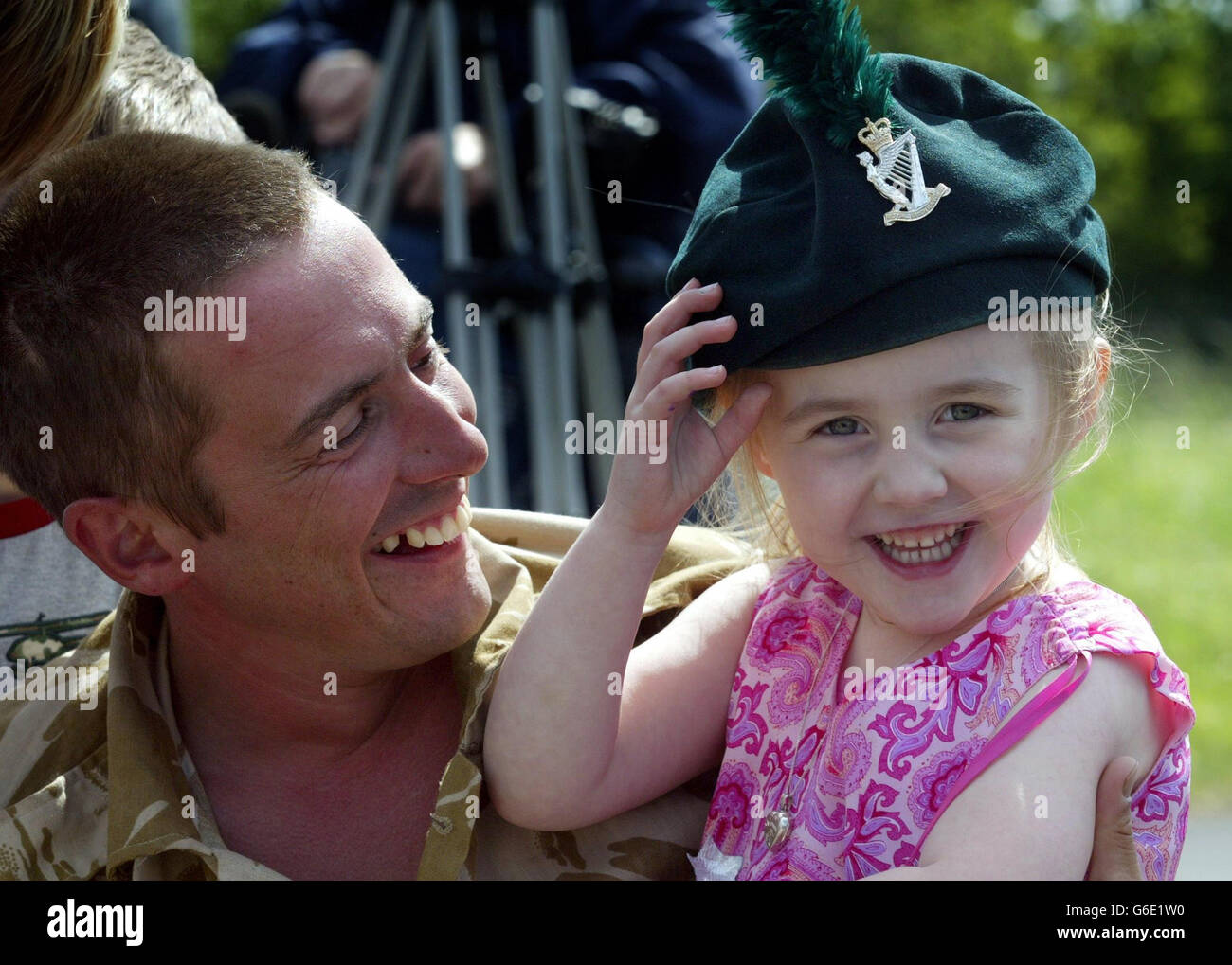 Ranger Andrew Glen from Ballyclare Co Antrim, is welcomed home by daughter Victoria aged three, on arrival at RAF Aldergrove in Belfast. He was one of thirty-three soldiers from the Royal Irish Rangers, who guarded 16 Air Assault Brigade headquarters during the Gulf conflict. *..During the war they had earned huge respect from the Regular Army for the vital security work they carried out. Lieutenant Colonel Andrew McCord, commanding officer of the Royal Irish Rangers, said officers had been unable to distinguish between full-time and TA soldiers during the war. Stock Photo