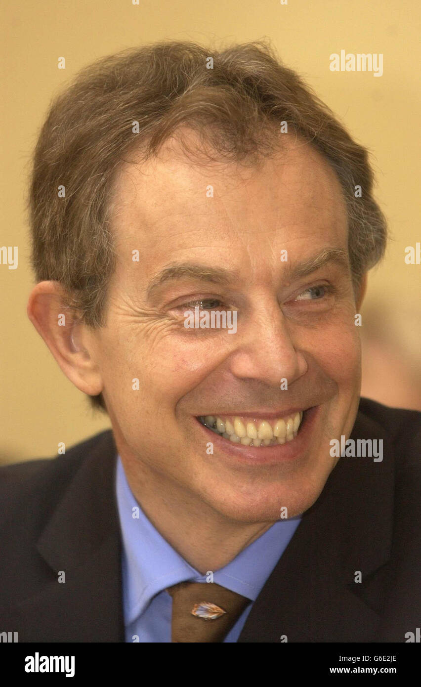 Prime Minister Tony Blair answers questions put to him by disabled youngsters at Downing Street. Blair met the disabled children who won their opportunity to share their ideas with him, after entering a 'PM for the day' competition run by the Disabled Rights Commission. 20/06/2003: Mr Campbell, Friday June 20, 2003, called on Mr Blair to officially set out his arguments against a referendum on the European constitution. Stock Photo