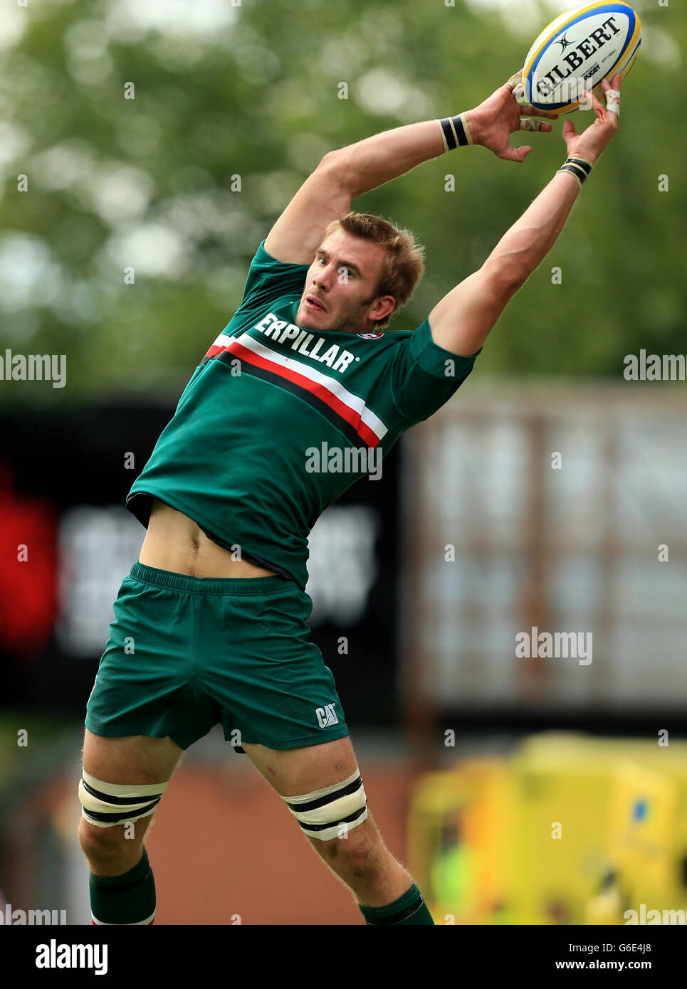 Leicester Tigers' Tom Croft jumps for the bal during the Aviva Premiership match at Welford Road, Leicester. Stock Photo