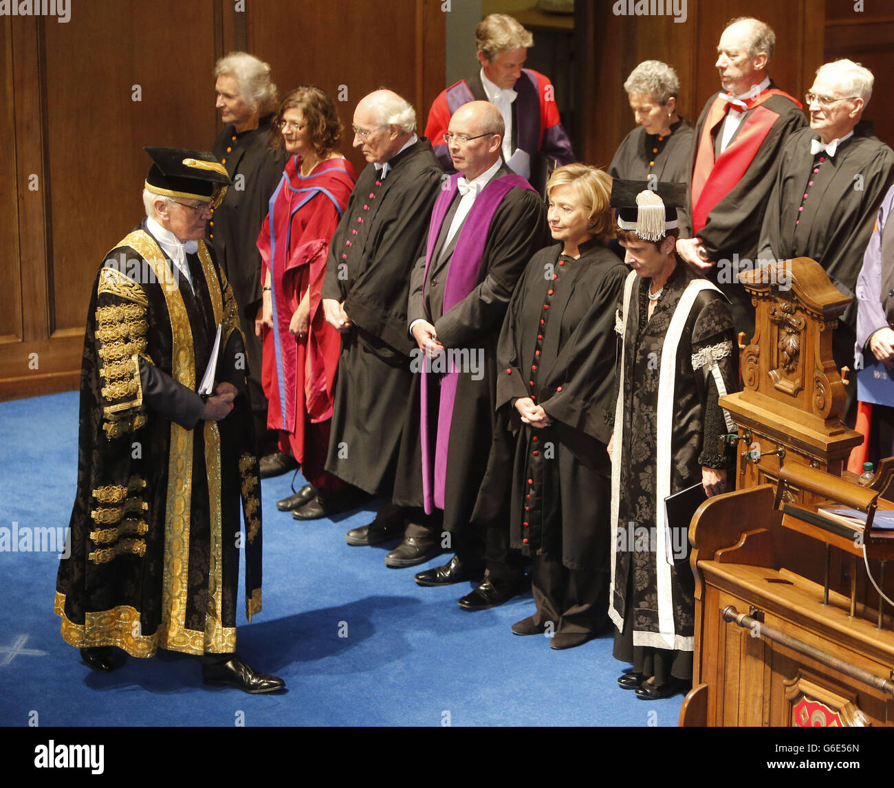Former US secretary of state Hillary Clinton (second right) with St Andrews University Chancellor Menzies Campbell (left) before she received an honorary degree from St Andrews University. Stock Photo