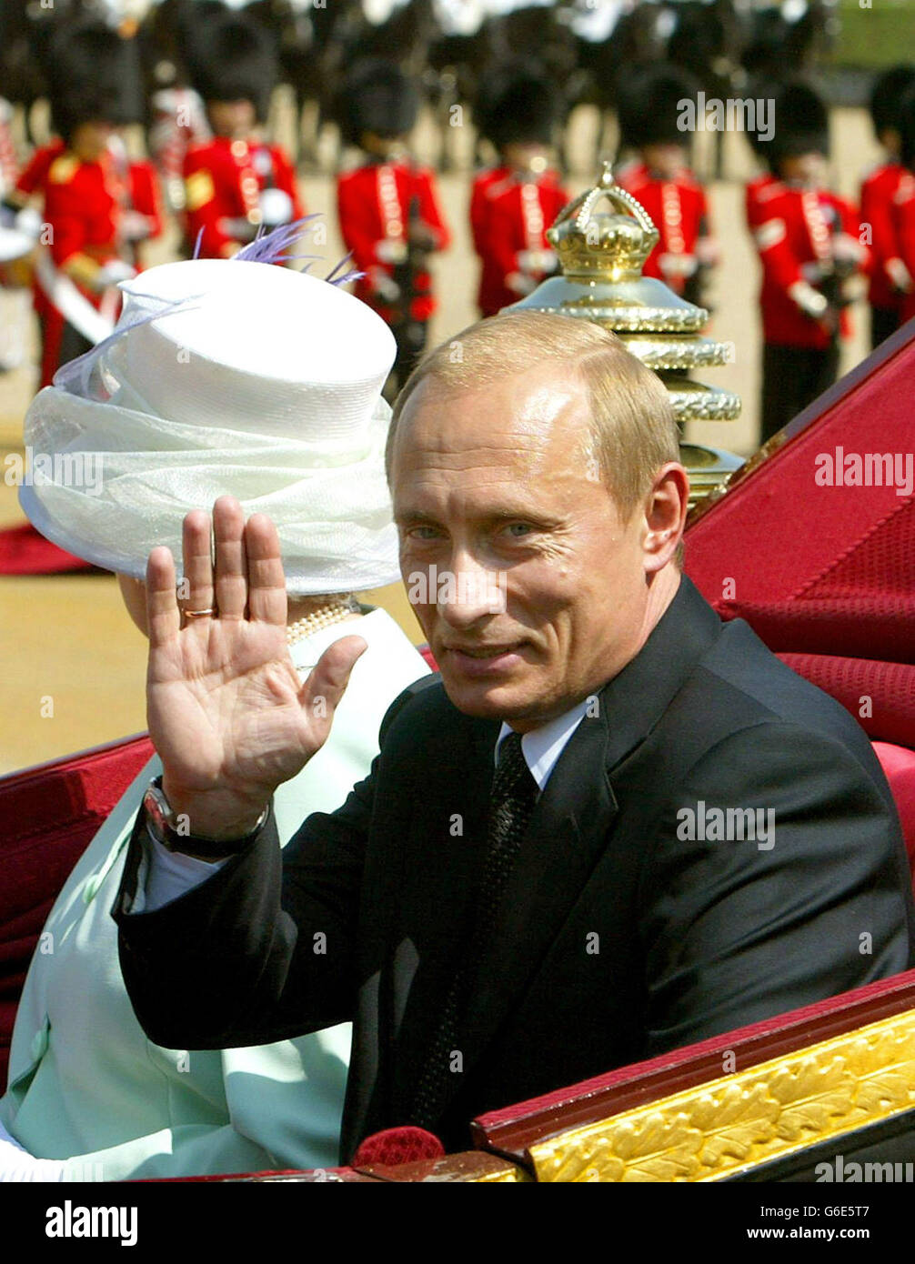 Britain's Queen Elizabeth II and Russian President Vladimir Putin arrive at Horse Guards Parade, London, on the first day of his state visit. It is the first state visit by a Russian leader since the days of the Tsars. Stock Photo