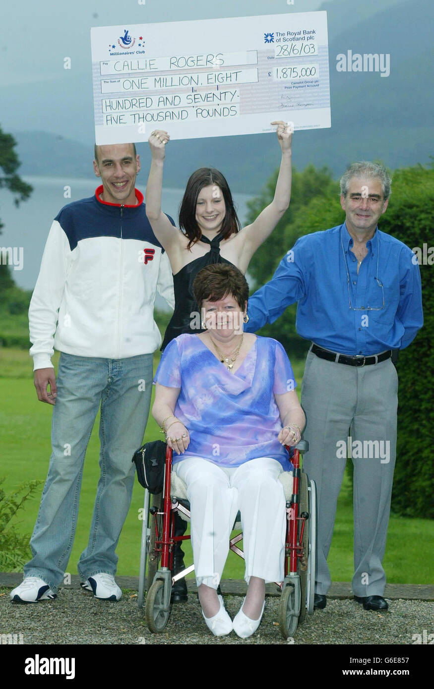 Sixteen-year-old Callie Rogers from Cockermouth in Cumbria celebrates with boyfriend Gary Fidler (left) and foster parents Ray and Sheila Holmes after winning 1.8 million on the National Lottery, becoming the second youngest jackpot winner. Stock Photo