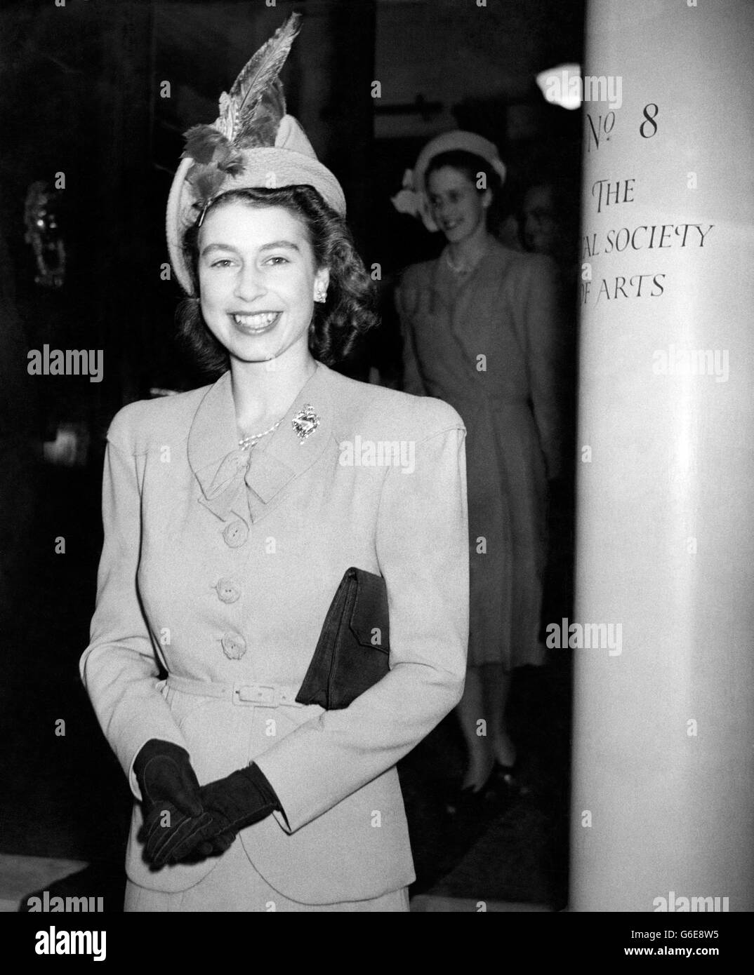 PRINCESS ELIZABETH officially reopened the war damaged Royal Society of Arts Lecture Hall, London, in her capacity as President of the Society. Picture Shows: PRINCESS ELIZABETH leaving the Royal Society of Arts Lecture Hall after the re-opening. Stock Photo