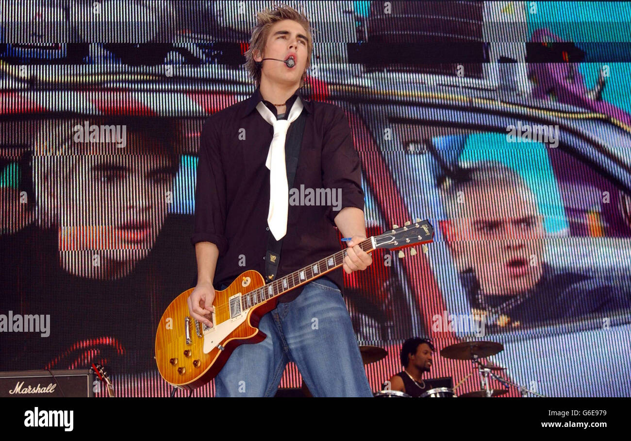 Busted performing on stage at the Capital Radio Party in the Park, in Hyde  Park, London. The concert is being held in aid of The Prince's Trust Stock  Photo - Alamy