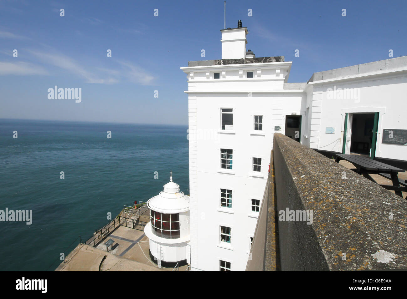 The West Lighthouse - also an RSPB sea-bird centre - on Rathlin Island, County Antrim, Northern Ireland. An inverted lighthouse with lamp at base.. Stock Photo