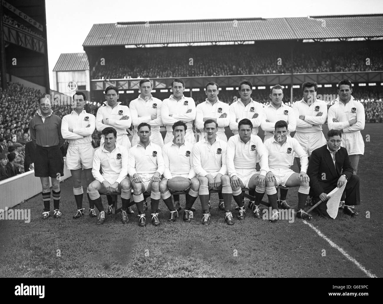 England team group. (top l-r) R C Williams (referee), Stephen Smith, Ned Ashcroft, David Marques, Muscles Currie, Larry Webb, Jeffrey Clements, Herbert Godwin, Gordon Bendon and James Hetherington. (front l-r) Malcolm Phillips, Peter Jackson, Jeff Butterfield, Peter Thompson, Alfred Herbert, Bev Risman and H Keenen (touch judge). Stock Photo