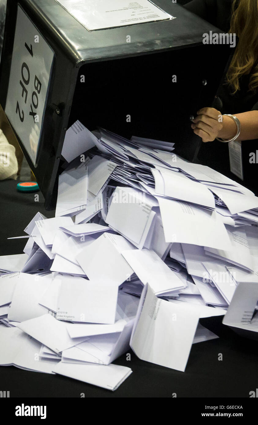 Ballot boxes are emptied at Manchester Central in Manchester, as counting gets underway in the referendum on the UK's membership of the European Union. Stock Photo