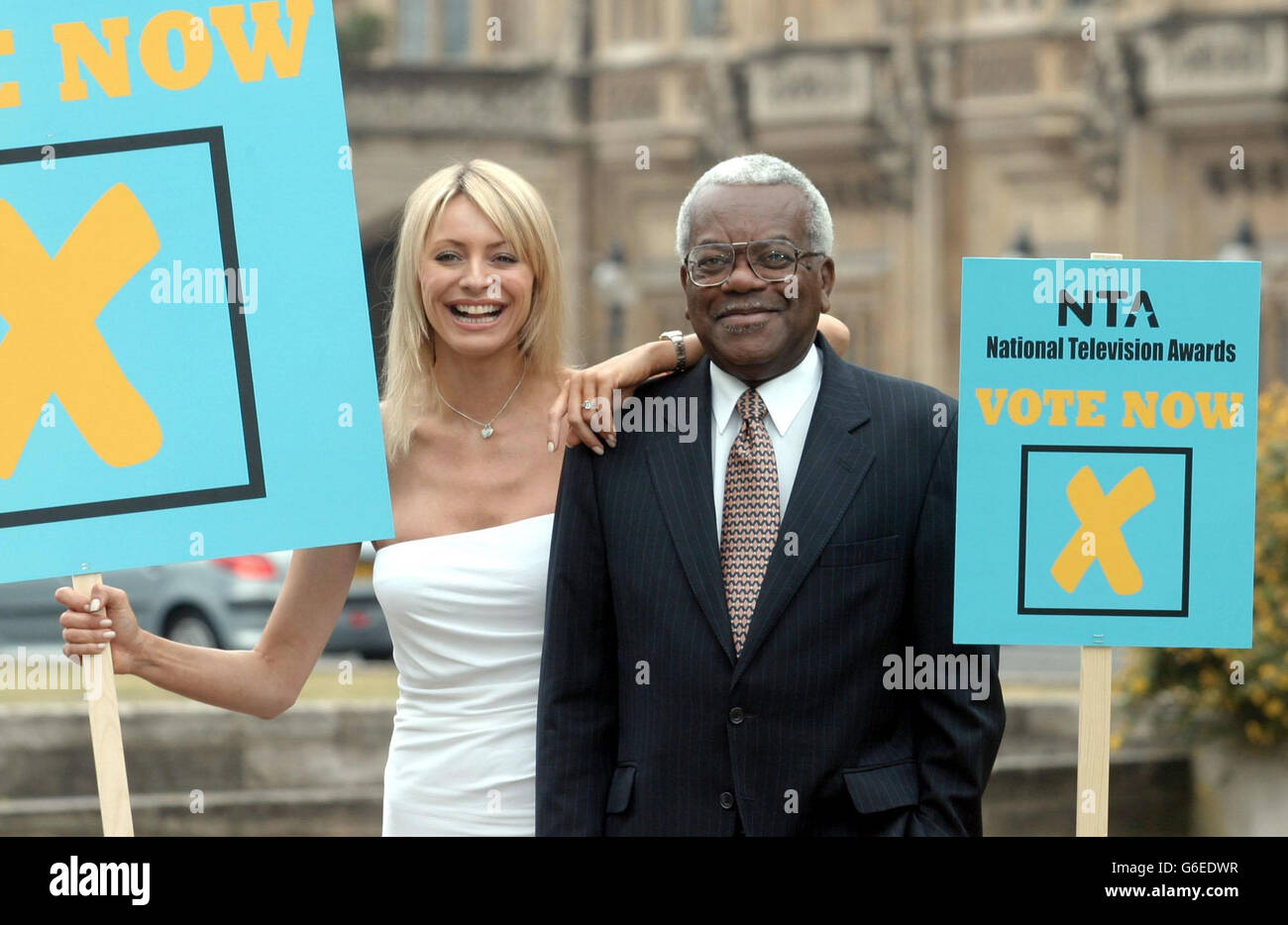 Sir Trevor McDonald and Tess Daly in Abingdon Gardens Westminster, London to mark the commencment of voting for the National Television Awards (NTA). Stock Photo