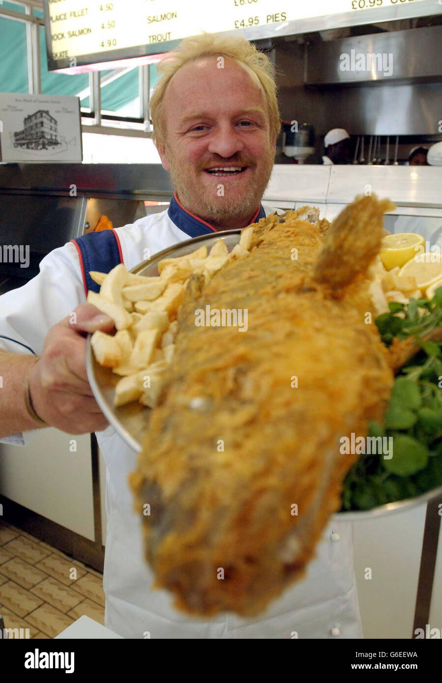 Celebrity chef Anthony Worrall Thompson samples the fish at The Seashell in Lisson Grove , north west London during the launch of the 16th annual Fish and Chip Shop of the Year Competition. * The competition organised by the Sea Fish Industry Authority (Seafish), to find the nation's best fish frier, reaches its climax early next year at a prestigious awards ceremony in London. Stock Photo