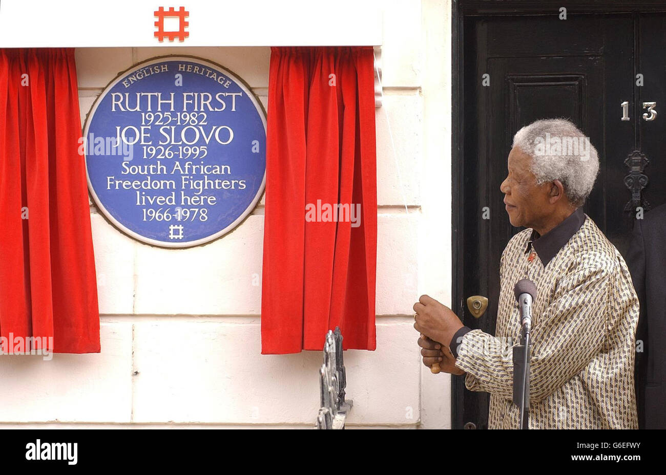Nelson Mandela payed a personal tribute to two prominent anti-apartheid activists at their former home in Camden, north London by unveiling a plaque in their honour. * The former South African president unveiled the blue plaque at 13 Lime Street where Ruth First and her husband, Joe Slovo, lived between 1966 and 1978. Stock Photo
