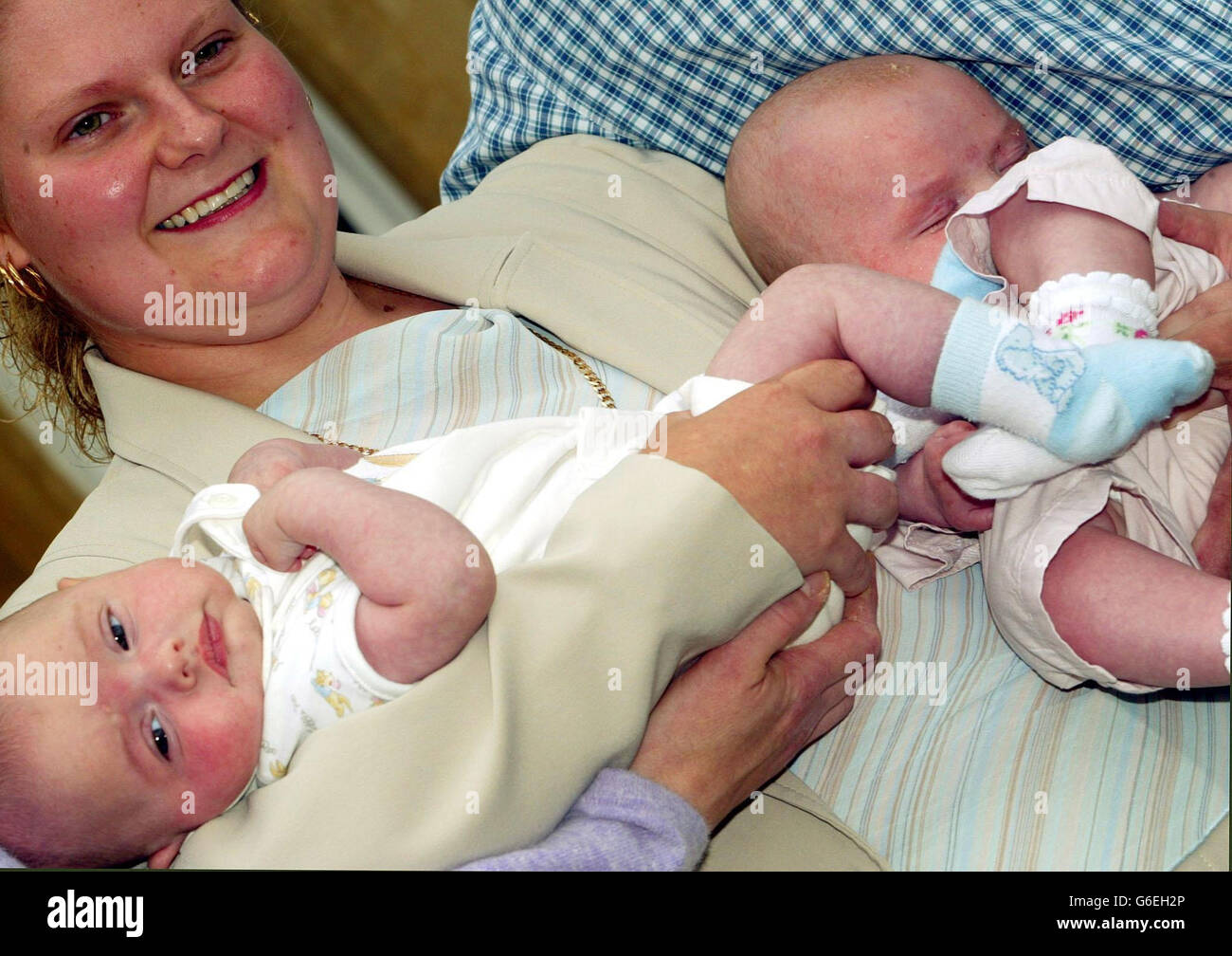 Social ivf smiling holding baby twins medical hi-res stock photography ...