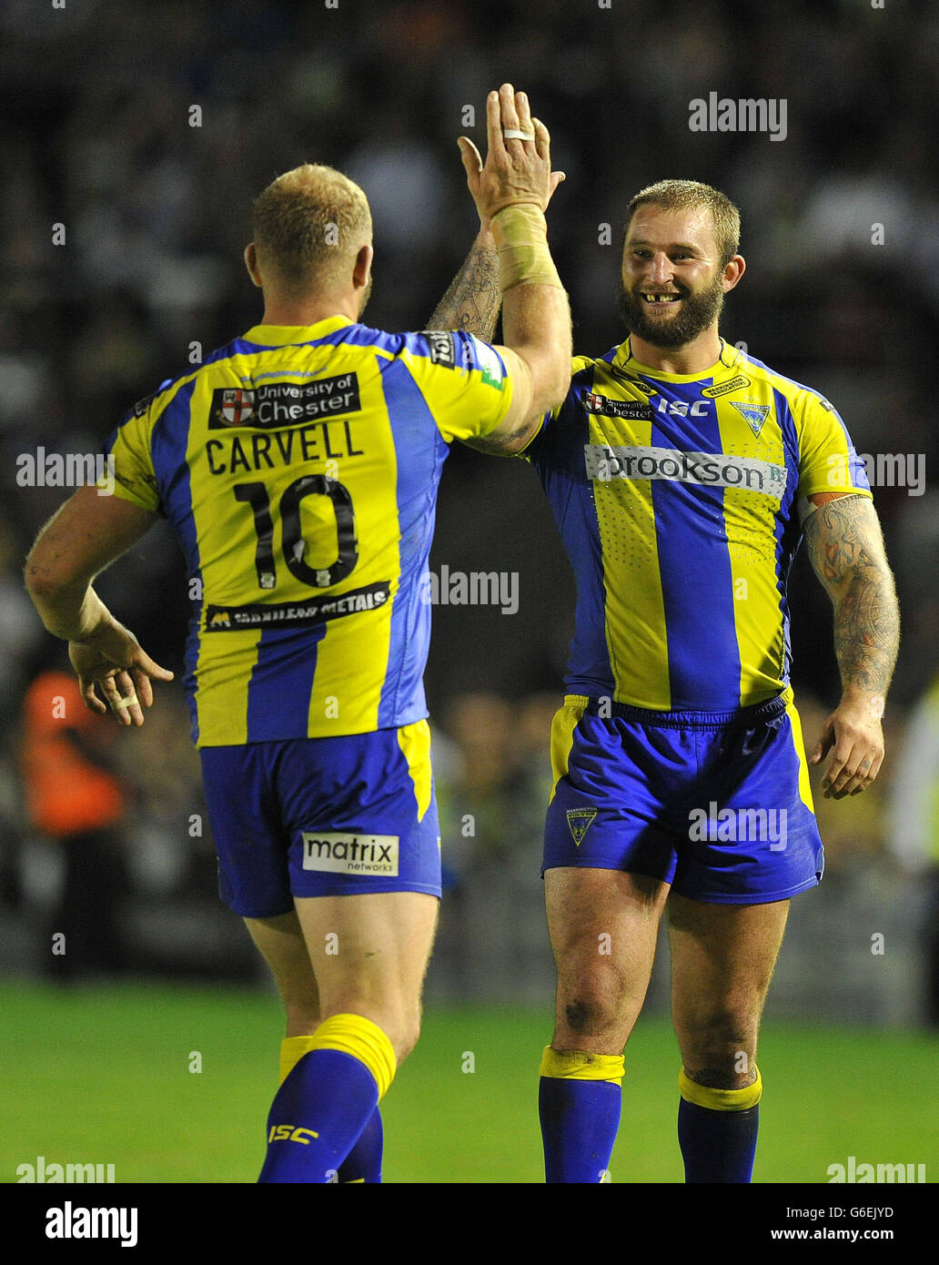 Warrington Wolves' Garreth Carvell and Paul Wood celebrate victory during the Super League Semi-Final match at The Halliwell Jones Stadium, Warrington. Stock Photo
