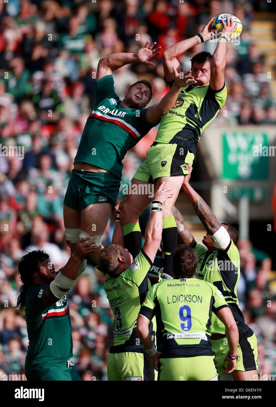Northampton Saints Tom Wood wins a lineout from Leicester Tigers Ed Slater during the Aviva Premiership match at Welford Road, Leicester. Stock Photo
