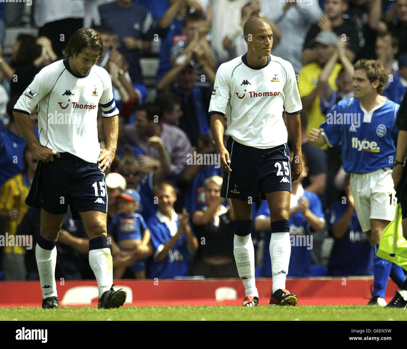 Tottenham Hotspur's Jamie Redknapp & Bobby Zamora (centre) show their dejection as Birmingham City's goalscorer David Dunn (right) celebrates at the final whistle after Birmingham City's 1.0 win over Tottenham Hotspur in the FA Barclaycard Premiership match at St Andrews, Birmingham. Stock Photo