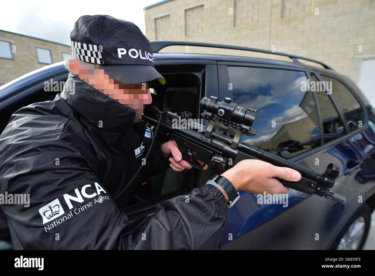 Officers of the newly formed National Crime Agency during a training exercise at the Northumbria Constabulary Ops Tactical training centre, South Tyneside. The head of 'Britain's FBI' has warned the Mr Bigs of the underworld there will be 'no one beyond the reach' of the new crime-fighting agency on the day it goes live. Stock Photo