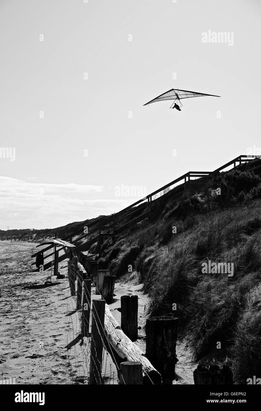A glider over a sandy beach Stock Photo - Alamy